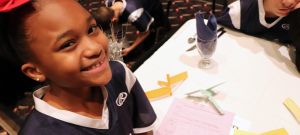 Girl smiling at 2020 Great Futures Dinner
